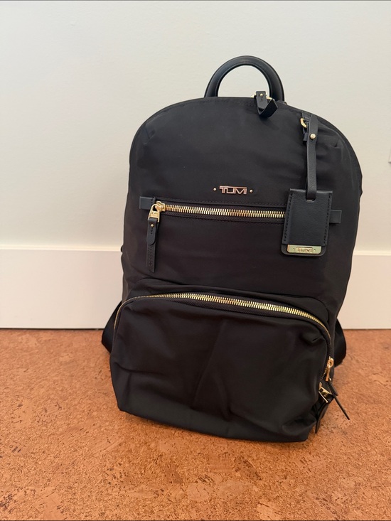 Tumi Handbags - Tumi Black Nylon Backpack with Gold Accents